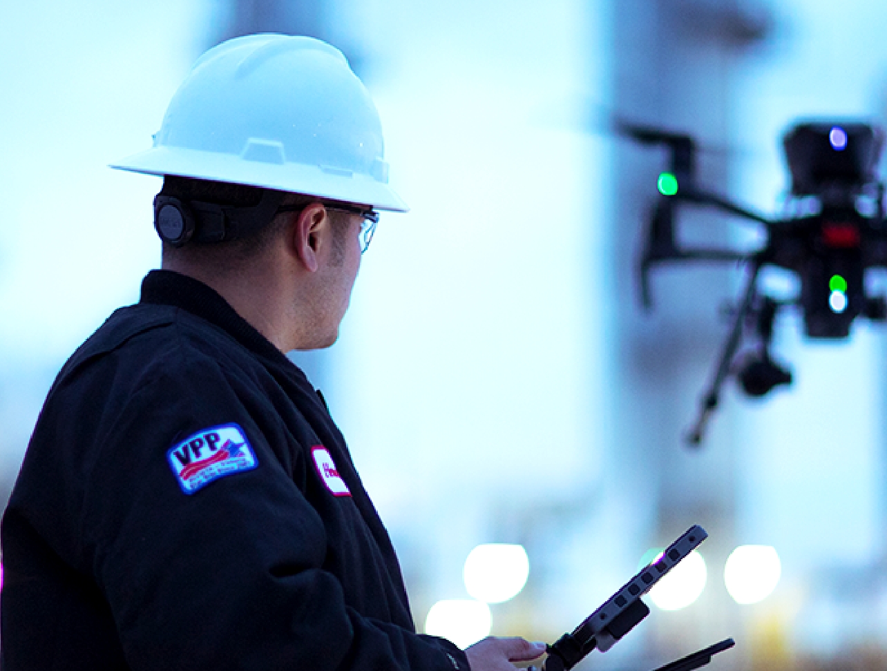 Koch employee piloting a drone