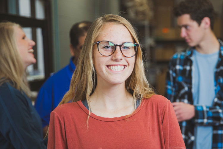 A student smiling